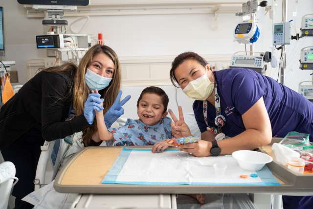 UCLA Mattel Children's Hospital patient with child life specialists