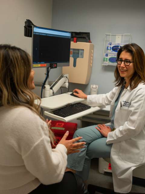 Dr. Sanaz Memarzdeh consulting with patient Grace Geaga